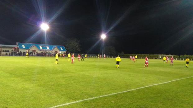 Masked man armed with golf clubs attack man at football match
